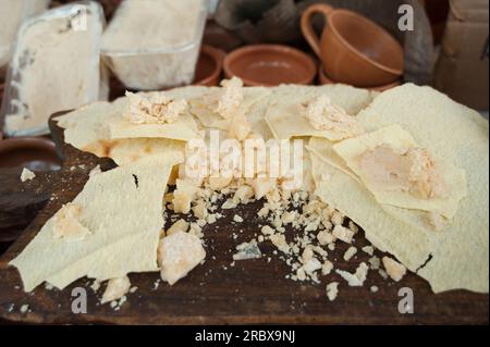 Casu Marzu and Carasau, traditional Sardinian sheep milk cheese that contains live insect larvae (maggots), Sardinia, Italy, Europe Sardinia; Sardinia Stock Photo