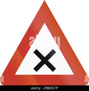 Old design (1937) of a German sign warning about crossroads. Stock Photo