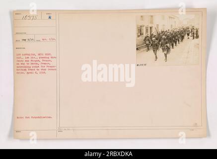 1st Battalion, 26th Regiment of Infantry, 1st Division, passing through the town of Sexey aux Forges, France. They are en route to Maron, France, the point of embarkation for the Franco-British front to counter the German advance. This photograph was taken on April 6, 1918, and it is designated as image number 111-SC-10375. Stock Photo