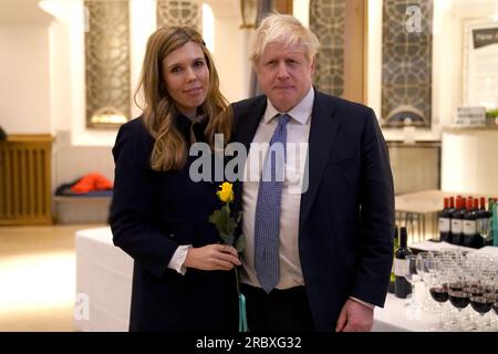 File photo dated 010/03/23 of former prime minister Boris Johnson with his wife Carrie Johnson in Westminster, London, for the launch of a campaign to prevent release of Robert Brown. Mr Johnson and his wife Carrie have welcomed their third child. Frank Alfred Odysseus Johnson is the couple's first child born since Mr Johnson left Downing Street last year after losing the confidence of his Conservative Party. Issue date: Tuesday July 11, 2023. Stock Photo
