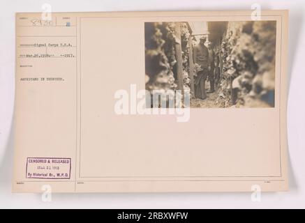 American soldiers in trenches during World War One. The photo was taken by the Signal Corps U.S.A. on March 26, 1918. It shows soldiers in a defensive position. The photograph was censored and released on March 23, 1918 by the Historical Branch of the War Plans Division. Stock Photo