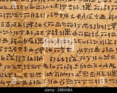 Translation of the Arabic text (Holy Quran), Stacks of holy Quran book ...