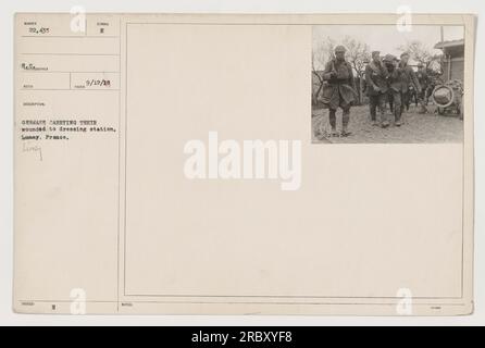 German soldiers are seen in this photograph carrying their wounded comrades to a dressing station in Limey, France, during World War One. The photo was taken on September 12, 1918. Stock Photo