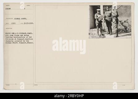 Major General J.T. Dickman, Commander of the 4th Army Corps, is seen leaving the headquarters of the 1st Division at Nonsard, France. The image, taken on September 13, 1918, shows the quarters that were formerly occupied by the German Staff. The photograph was captured by the Signal Corps and is numbered 22498 in their records from 1919. Stock Photo