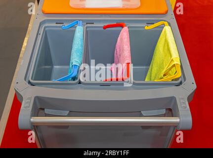 Colour Coded Microfiber Cloth at Janitors Trolley Cart Cleaning Equipment Stock Photo