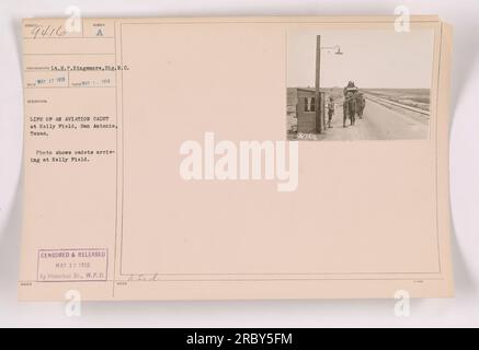 Caption: 'Photograph showing aviation cadets arriving at Kelly Field in San Antonio, Texas during World War I. Taken on May 1, 1918, this image captures the daily life of an aviation cadet at the field. The photo was released and censored on May 17, 1918 by the Historical Branch, War Plans Division.' Stock Photo