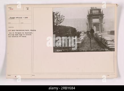 French officials piling sandbags at the Arc de Triomphe du Carrousel in Paris as part of air raid protection measures during World War One. The sandbags were put in place to safeguard the beauty of the city. Photograph identified by the number 9514 and taken by an official photographer. Stock Photo