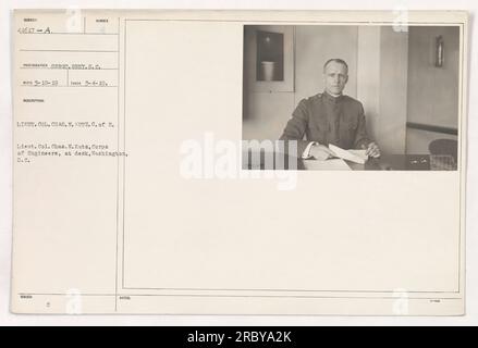 Lieutenant Colonel Chas. M. Kutz, Corps of Engineers, is seen at his desk in Washington, D.C. The photograph was taken on March 4, 1919, by photographer Serot. The image is labeled as 111-SC-41617a, with a corresponding description and notes numbered as 41617-A and 2041617 respectively. Stock Photo