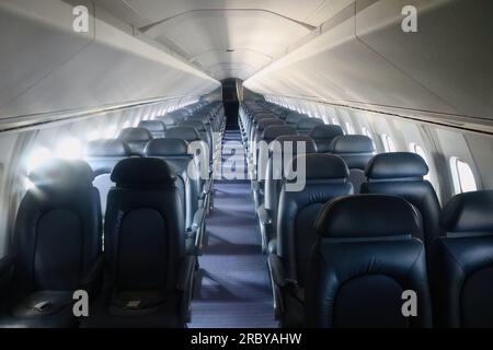 Cabin with passenger seating in the interior of Aérospatiale and British Aircraft Corporation Concorde G-BOAG Seattle Washington State USA Stock Photo