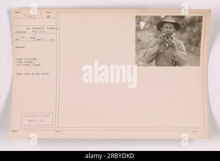 Soldiers from the 40th Division, stationed at Camp Kearny in San Diego, California, gather for a meal during training exercises in April 1918. This photograph was taken by Lieutenant Edward H. Jackson and was censored and released on May 3, 1918, by the War College Division. Stock Photo