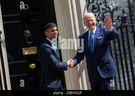 London, United Kingdom. 10th July, 2023. U.S President Joe Biden, right, shakes hands with British Prime Minister Rishi Sunak, on arrival for bilateral discussions to 10 Downing Street, July 10, 2023 in London, England. Biden is the United Kingdom prior to attending the NATO Summit in Lithuania. Credit: Simon Walker/Simon Walker/No 10 Downing Street/Alamy Live News Stock Photo