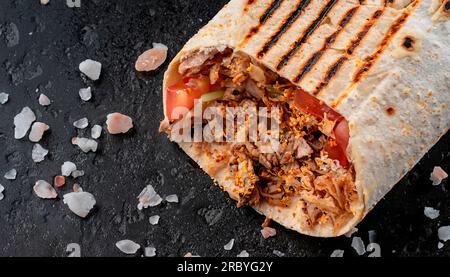 A closeup shot of delicious shawarma cut in a half Stock Photo