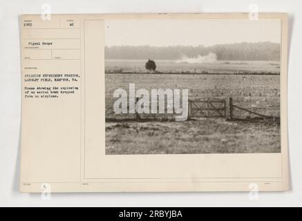 Explosion of an aerial bomb dropped from an airplane at the Aviation Experiment Station, Langley Field, Hampton, VA. The photograph was taken in 1880 by a photographer associated with the Signal Corps. Stock Photo