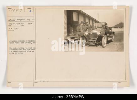 Lt. H.P. Kingsmore of Sig. R.C takes aviation students in training at Kelly Field, San Antonio, Texas on May 27, 1918. In the photograph, a cadet who has received his commission and furlough bids farewell to his friend before going on leave. Image reference: 111-SC-11057 71057. Stock Photo