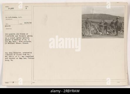 Members of Co. C. 1st Gas Regt., 80th Division load and fire phosphorus and Thermite shells using a trench mortar battery. The photograph was taken on October 27, 1918 in Le Neufour, Meuse, France. The 80th Division was initially made up of soldiers from Virginia, Maryland, and the District of Columbia, and was trained at Camp Lee in Petersburg, Virginia. Stock Photo