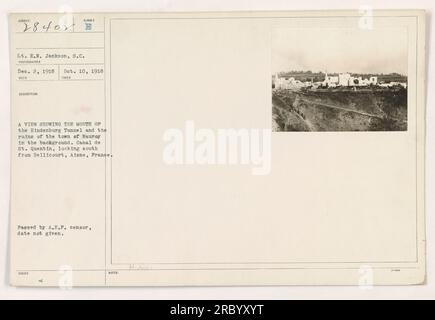 A photograph taken on Dec. 2, 1918, by Lt. E.N. Jackson, S.C., depicts the view of the mouth of the Hindenburg Tunnel and the ruins of the town of Nauroy in the background. The location is near the Canal de St. Quentin, looking south from Bellicourt, Aisne, France. The photograph was passed by the A.E.P. censor, with the exact date not provided. Stock Photo