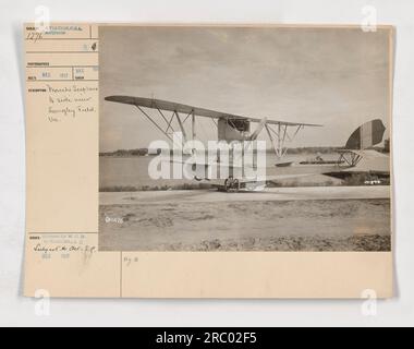 A Macchi seaplane is seen in a 3/4 side view at Langley Field, Virginia in 1917. The photograph was taken at Sangley Field. It was released by W.O.D. to the Photo Division Supply Officer on December 199, and issued for distribution in December 1917. Reference number: 111-SC-1276. Stock Photo