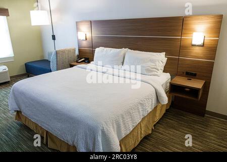 Alpharetta Atlanta Georgia,Holiday Inn Express Alpharetta - Roswell IHG Hotel,inside guest room made king size bed Stock Photo