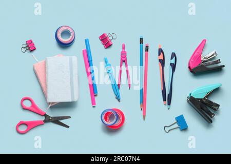 Composition with stationery supplies on blue background Stock Photo