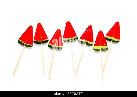 Lollipops in shape of watermelon slice on white background Stock Photo