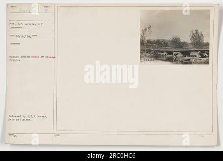 Private R.P. Antrim, from South Carolina, standing on the Sumber E Bridge across the Vesle River in Pisme, France during World War One. The photograph was taken by an unknown photographer on an unknown date and was released by the A.E.F. censor. Notes: 22124. Stock Photo