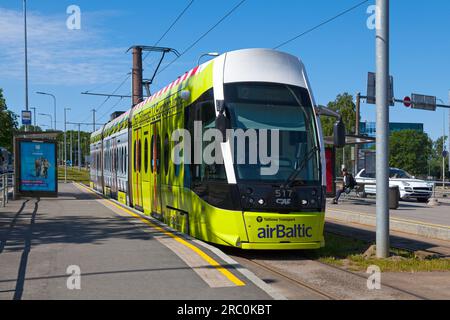 Tallinn, Estonia - June 16 2019: Tram waiting for the green light at a station near the port. Stock Photo