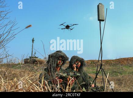 HUAIBEI, CHINA - JULY 10, 2023 - Soldiers use drones to conduct reconnaissance in front of Huaibei city, Anhui province, China, July 10, 2023. Stock Photo