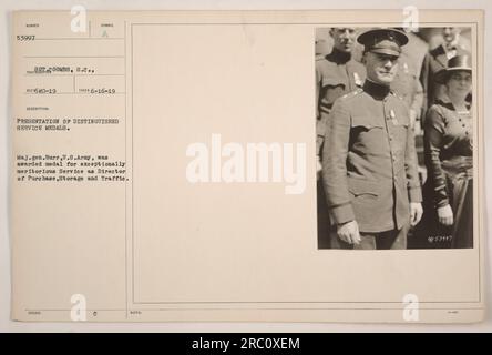 Major General Burr of the U.S. Army is presented with a Distinguished Service medal. The medal is awarded to him for his exceptional service as the Director of Purchase, Storage, and Traffic during World War I. The photograph was taken on June 16, 1919. Stock Photo