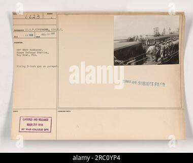 Image of soldiers firing a 3-inch gun on a parapet at Key West Barracks, Coast Defense Station, Key West, Florida on February 28, 1918. Photograph taken by Lieutenant H.P. Kingsmore and was censored and released on March 22, 1918 by the War College Div. Laboratory. Similar subject filed under number 906623. Stock Photo