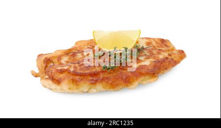 Tasty fish in soda water batter, thyme and lemon slice isolated on white Stock Photo