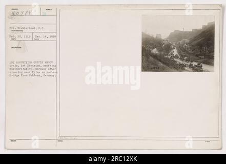 First Division's Ammunition Supply Wagon Train entering Ehrenbreitstein, Germany after crossing the Rhine on a pontoon bridge from Coblenz in February 26, 1919. Photograph taken by Pvt. Brotherhood, S.C on December 14, 1918. Issued by AxA American Military Visuals. Caption is based on the information provided with the image. Stock Photo