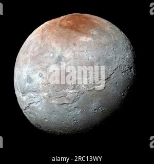 Charon's color palette is not as diverse as Pluto's; most striking is the reddish north (top) polar region, informally named Mordor Macula, as seen by NASA's New Horizons. The spacecraft captured this high-resolution enhanced color view of Charon, Pluto's largest moon, just before closest approach on July 14, 2015. The image combines blue, red, and infrared images taken by the spacecraft's Ralph/Multispectral Visual Imaging Camera (MVIC); the colors are processed to best highlight the variation of surface properties across Charon.New Horizons conducted a six-month-long reconnaissance flyby stu Stock Photo