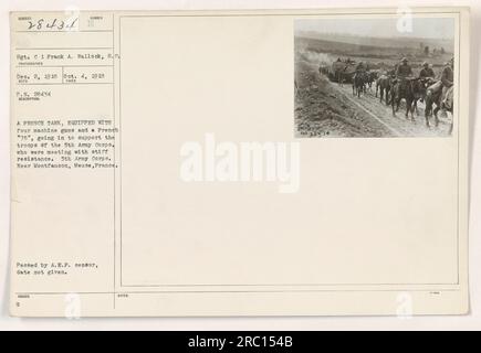 A French tank equipped with four machine guns and a French '75' artillery piece moves to support the troops of the 5th Army Corps during a battle near Montfaucon, Meuse, France. The photograph was taken on October 4, 1918, and approved by the A.E.F. censor. Stock Photo