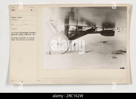 Aviation Experiment Station at Langley Field in Hampton, VA. This image displays the position of an aerial bomb as it is carried by airplanes. This photo was taken by the Signal Corps, bearing the identification number 3280. Stock Photo