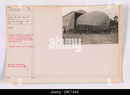 Student officers of the Coast Artillery School receiving instruction in balloon observation of artillery fire at Fortress Monroe, Virginia. The image shows Lieutenant Wn. Pox leading a balloon out of the hangar. This photograph was taken on April 1918, and it was kept for official use only, not intended for publication. Stock Photo