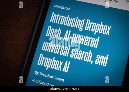 Vancouver, CANADA - Jun 29 2023 : A blog post “Introducing Dropbox Dash, AI-powered universal search, and Dropbox AI” seen in an iPhone screen. Stock Photo