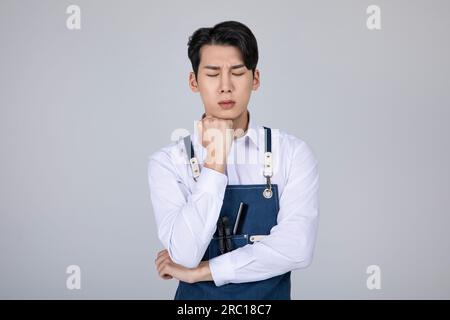 millennials and gen z, korean asian young man struggling Stock Photo