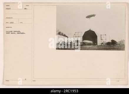 Balloon hangars at Fort Omaha, Nebraska, captured in a photograph from 1919. This image shows the issued balloon hangars. The photographer is credited as Goodyear Ma. Co. Symbol AU. C. Stock Photo