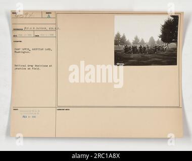 National Army Musicians practicing on the field at Camp Lewis, American Lake, Washington. Taken on February 5, 1918, by Lt. E.N. Jackson of the Signal Corps. Image number 4594. This photograph was released by the War Office Department to the Photo Division on February 19, 1918. Stock Photo