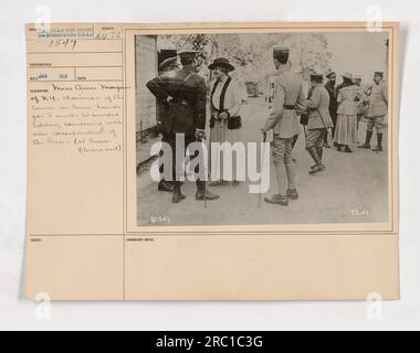 Chairman of the Committee on American Funds for French Wounded Soldiers, Miss Anne Morgan, is seen conversing with war correspondents at Aisne Blerancourt in this photograph taken in 1918. Miss Morgan is known for her involvement in providing support to wounded soldiers during World War One. Stock Photo