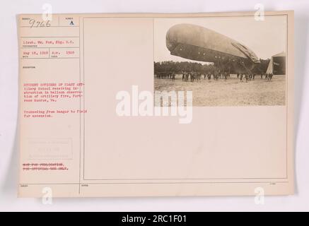 Student officers of the Coast Artillery School receiving instruction in balloon observation of artillery fire at Fortress Monroe, Virginia. The photograph shows the officers proceeding from the hangar to the field for ascension. Taken on April 18, 1918. Lieutenant William Fox of the Signal Reserve Corps is also present. This image is not for publication and is for official use only. Stock Photo