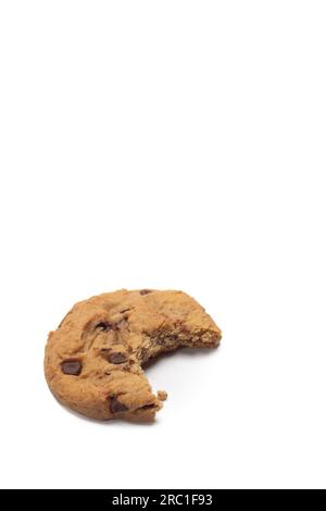 close up of chocolate chip cookie on white background with copy space, bakery, sweet dessert, with bite missing Stock Photo