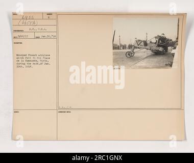 Ruined French airplane which fell in Place Concorde, Paris. The photograph, numbered 6956, was taken on January 30, 1918. It shows a wrecked French airplane that crashed during a raid on that day. The image is part of the American Military Activities during World War One collection. Stock Photo