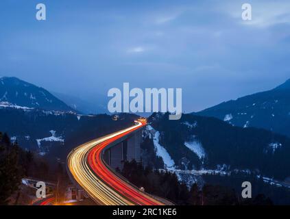 Europabruecke, Brenner motorway A13, with 190 metres height highest bridge in Austria, night photo with light traces of the cars, Schoenberg im Stock Photo