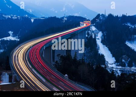 Europabruecke, Brenner motorway A13, with 190 metres height highest bridge in Austria, night photo with light traces of the cars, Schoenberg im Stock Photo