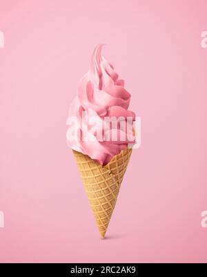 Tasty raspberry or strawberry ice cream in waffle cone on pastel pink background. Soft serve Stock Photo