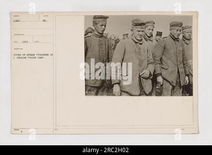 German prisoners captured during World War I in Belgium are seen in a camp. The photograph, registered in 1919, showcases the various types of German prisoners detained in the Belgian prison camp. Stock Photo