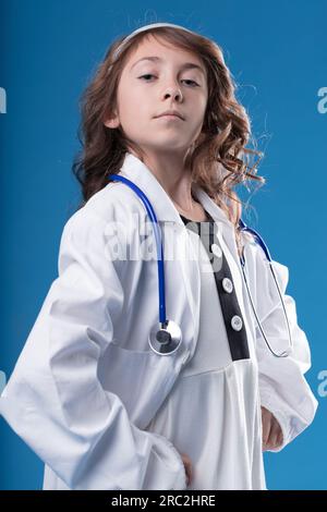 handsome elegant doctor in blue uniform with stethoscope posing and looking  at the camera isolated on white background 16401416 Stock Photo at Vecteezy