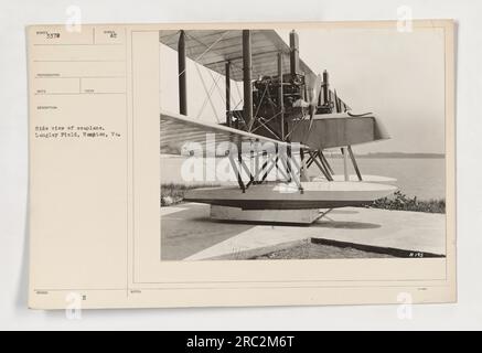 Side view of a seaplane at Langley Field in Hampton, Virginia. This photograph is part of a series documenting American military activities during World War One. It provides a clear image of the seaplane, highlighting its design and structure. The seaplane was used for various purposes, including reconnaissance and transportation. Stock Photo