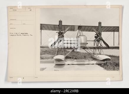 Side view of a seaplane at Langley Field in Hampton, Virginia. The photograph, taken by photographer #3374, showcases the aircraft's design and structure. Langley Field was an important military base during World War One, and this seaplane would likely have been used for reconnaissance or patrol missions. Stock Photo